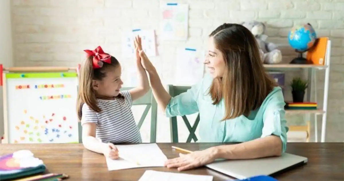 Mom and girl enjoying homeschool together
